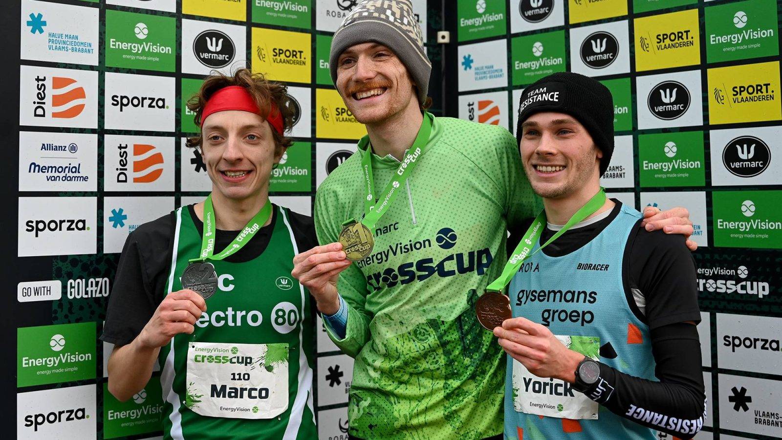 Belgian Marco Vanderpoorten, Luxembourg's Ruben Querinjean and Belgian Yorick Van De Kerkhove pose with their medals after the men's race at the CrossCup cross country running athletics event in Diest, the fourth stage of the CrossCup competition, on Sunday 15 February 2026. BELGA PHOTO ELIAS ROM